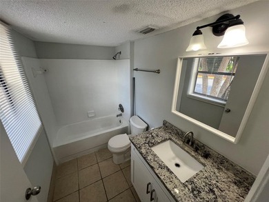 ALL AGES GATED COMMUNITY FIRST FLOOR UNIT TOTALLY REMODELED WITH - photo 26
