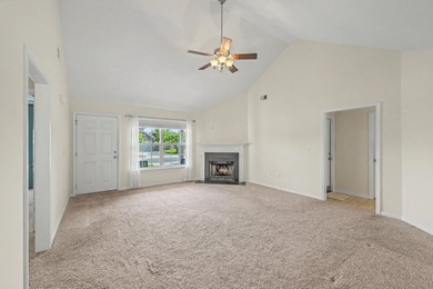 Nestled on a prime corner lot with serene pond views, this - photo 8