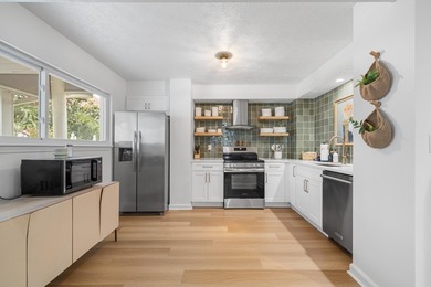 Seller will consider contributing up to $50K toward Buyer - photo 50