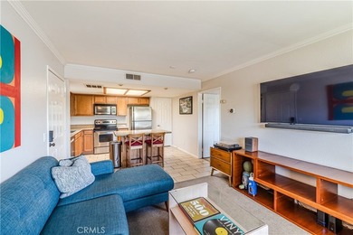 Welcome Home to The Palms, where a west-facing corner unit on - photo 1
