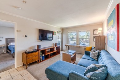 Welcome Home to The Palms, where a west-facing corner unit on - photo 2