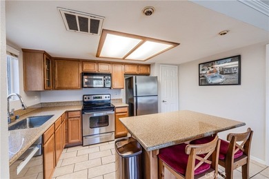 Welcome Home to The Palms, where a west-facing corner unit on - photo 6