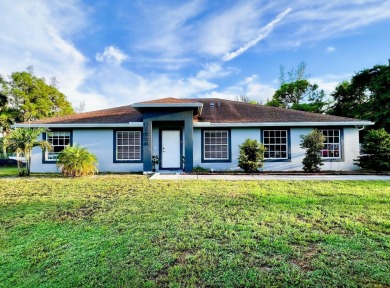 Lake Home For Sale in The Acreage, Florida