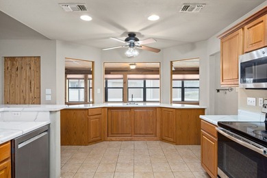 Well maintained 4-bedroom, 3-bath single-level home on 1.85