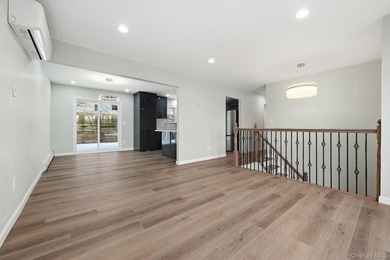 Welcome to this beautifully updated 6-bedroom, 2.5-bath home in - photo 2