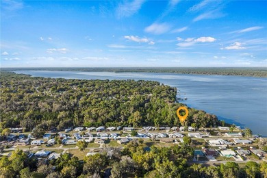 Tucked into a quiet waterfront community, this well-kept home - photo 3