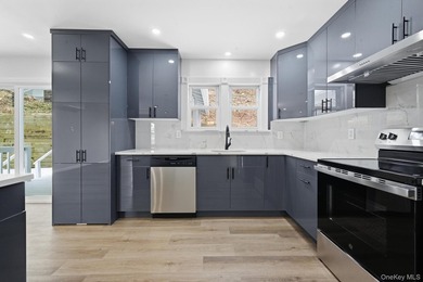 Welcome to this beautifully updated 6-bedroom, 2.5-bath home in - photo 3