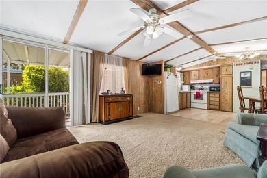 Tucked into a quiet waterfront community, this well-kept home - photo 5