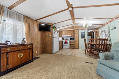Tucked into a quiet waterfront community, this well-kept home - photo 7