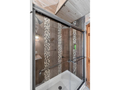 This 5-BD, 4-BA, 3,847-square-foot, 3-story home w/ 70 feet of - photo 27