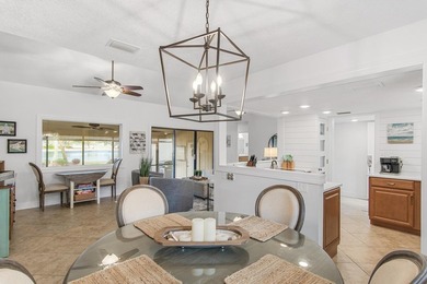 Enjoy stunning panoramic views of the lake, golf course, and - photo 13