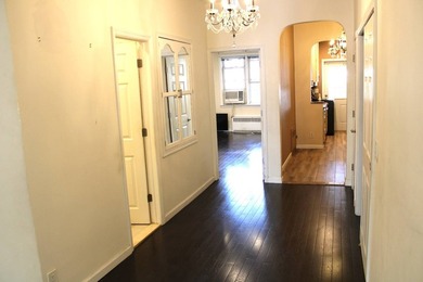 FOR SALE Beautiful & Versatile 3-Family Brick Home in Prime Bath - photo 12