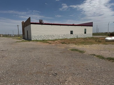 2.5 Acres Super Location off Loop 250 N. Improvements an updated