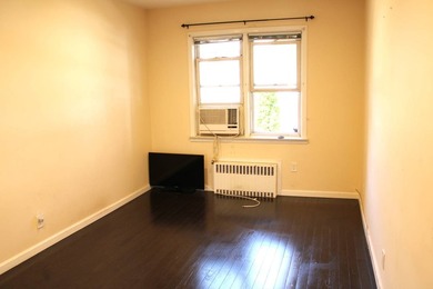 FOR SALE Beautiful & Versatile 3-Family Brick Home in Prime Bath - photo 17
