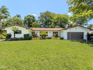 Welcome to this spacious 3-bedroom, 2-bathroom home situated on - photo 1