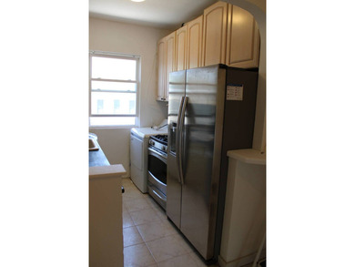 FOR SALE Beautiful & Versatile 3-Family Brick Home in Prime Bath - photo 22
