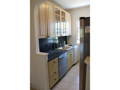 FOR SALE Beautiful & Versatile 3-Family Brick Home in Prime Bath - photo 23
