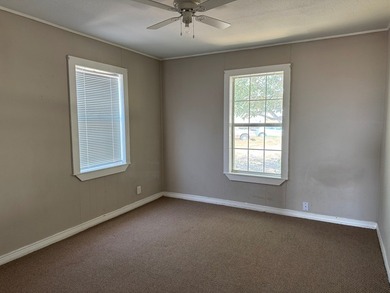 2.5 Acres Super Location off Loop 250 N. Improvements an updated