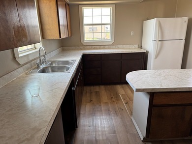 2.5 Acres Super Location off Loop 250 N. Improvements an updated