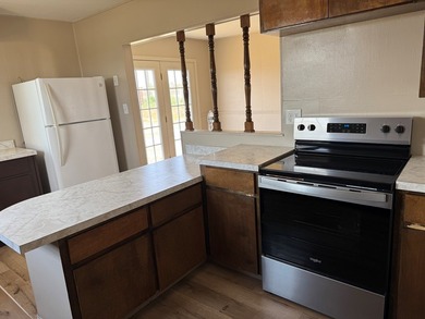 2.5 Acres Super Location off Loop 250 N. Improvements an updated