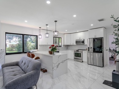 Welcome to this spacious 3-bedroom, 2-bathroom home situated on - photo 6