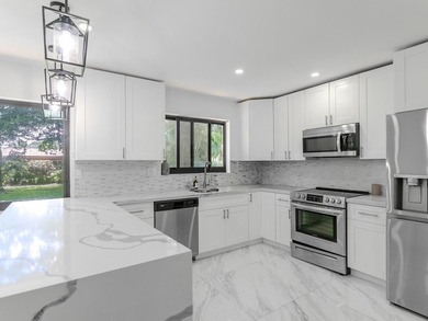 Welcome to this spacious 3-bedroom, 2-bathroom home situated on - photo 7