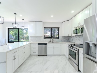 Welcome to this spacious 3-bedroom, 2-bathroom home situated on - photo 9