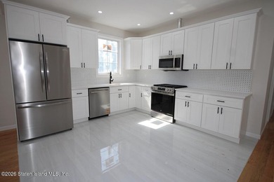 *New Construction* Stunning Two Family detached house with 9ft - photo 12
