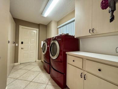 Lakefront living in the heart of St. Lucie West! This spacious - photo 22