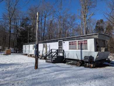 Pocono Peak Lake Home Sale Pending in Gouldsboro Pennsylvania