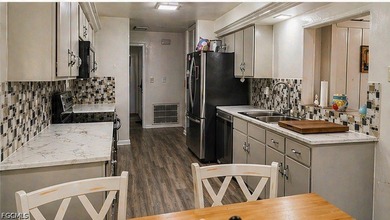 Enjoy true Florida waterfront living in this desirable - photo 5