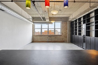 Discover authentic North Loop loft living in this bright - photo 11