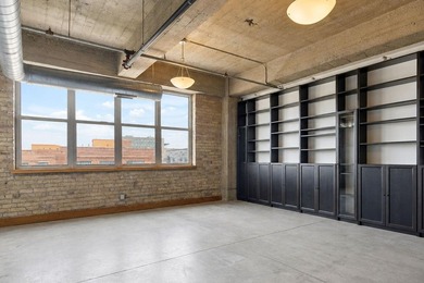 Discover authentic North Loop loft living in this bright - photo 13