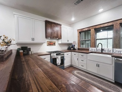New construction in the Ozarks with White River frontage and - photo 9