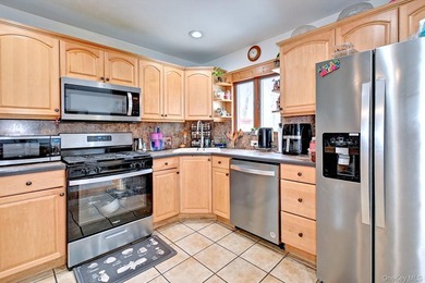 UPDATED SPACIOUS CAPE , 4 BEDROOMS 2 BATHROOMS, EAT IN KITCHEN - photo 13