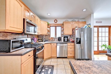 UPDATED SPACIOUS CAPE , 4 BEDROOMS 2 BATHROOMS, EAT IN KITCHEN - photo 14