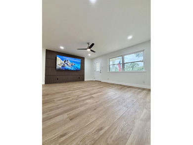 This updated 4-bed, 2-bath home in the highly desired Lake - photo 15