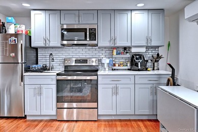 UPDATED SPACIOUS CAPE , 4 BEDROOMS 2 BATHROOMS, EAT IN KITCHEN - photo 27
