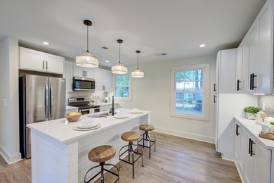 Beautifully renovated brick ranch home tucked away in the heart - photo 1