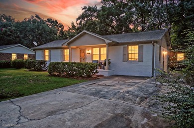 Beautifully renovated brick ranch home tucked away in the heart - photo 2