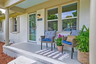 Beautifully renovated brick ranch home tucked away in the heart - photo 3