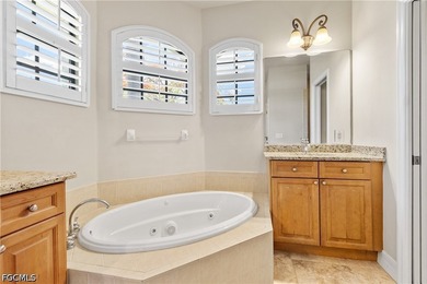 Located in highly sought-after Unit 58, this lakefront Gulf - photo 23