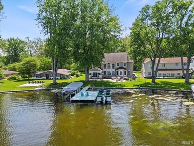 Experience exceptional lakefront living in this custom-built - photo 1