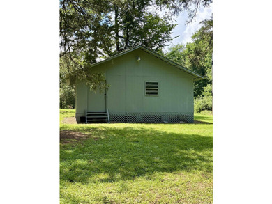 Nestled just a one-minute walk from beautiful Lake Ludwig, this - photo 7