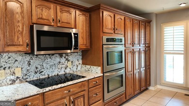 Charming 3 Bedroom raised ranch in the highly sought-after - photo 3