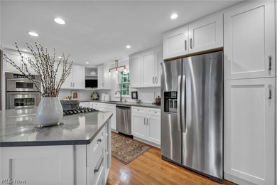 Nestled on a deep, wooded lot just a short walk from Huntington - photo 7