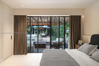 Welcome to this stunning Miami Beach residence where privacy - photo 20