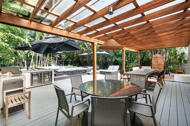 Welcome to this stunning Miami Beach residence where privacy - photo 26
