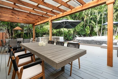 Welcome to this stunning Miami Beach residence where privacy - photo 27