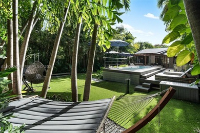 Welcome to this stunning Miami Beach residence where privacy - photo 32